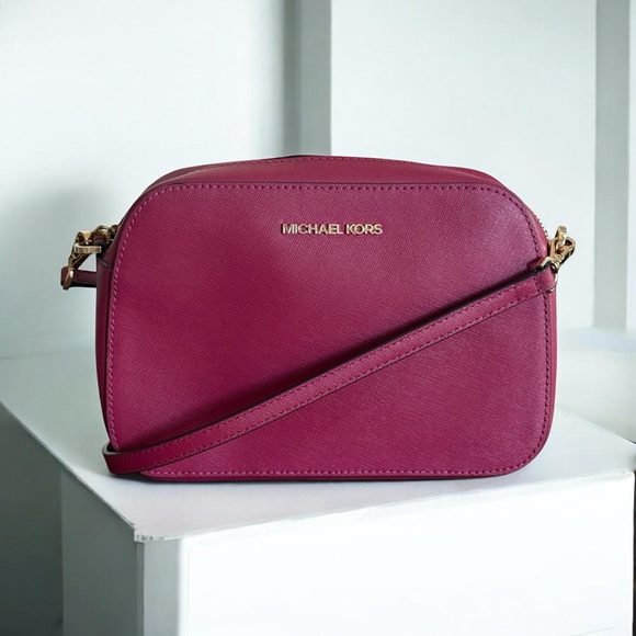 Michael Kors Handbags - Authentic Michael Kors Magenta Crossbody Bag with Gold Hardware